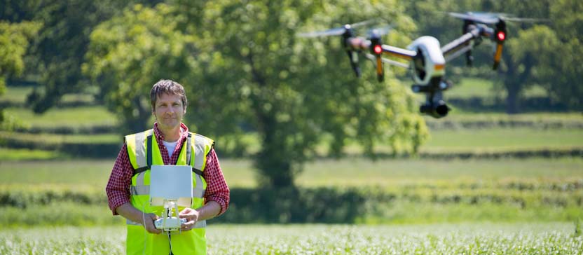 Farmer using drone.